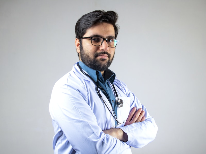 Professional doctor in white coat with stethoscope at MedHope Hospital